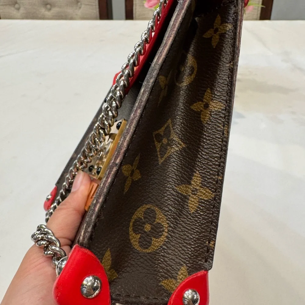 Authentic Louis Vuitton Tribal mask chained shoulder bag